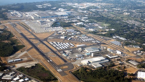 Boeing"s Everett Facility at Paine Field photographed from the air in 2009 with runway 16R/34L on the left side. Image Courtesy: Boeing