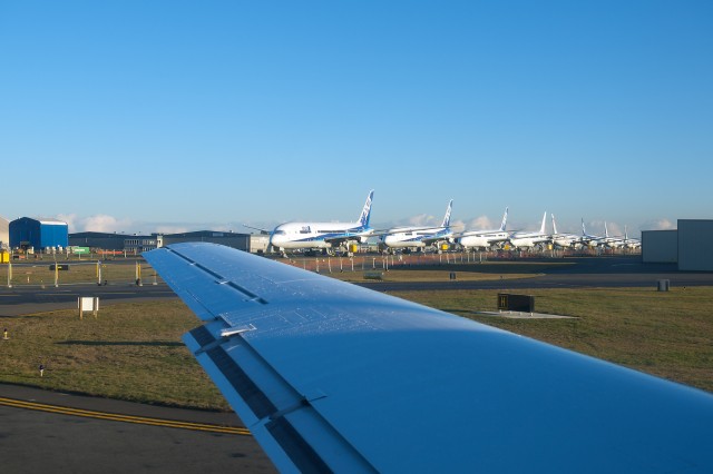 A sixty-one year old wing and some 787s, What a contrast! Photo by Bernie Leighton | AirlineReporter.com