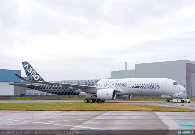 Click Image for Larger Verion. Photo and information from Airbus: On Thursday 2nd January 2014 Airbus rolled-out its third A350 XWB flight-test aircraft, MSN2, from the paint shop in Toulouse, marking yet another successful milestone on the path to entry-into-service in Q4 2014. As well as featuring a distinctive â€œCarbonâ€ signature livery to reflect its primary construction from advanced materials, this aircraft is also the first of two A350 flight test aircraft to be equipped with a full passenger cabin interior. MSN2 will join the A350 XWB flight test fleet in the coming weeks and will be the first A350 to transport passengers when it undertakes the Early Long Flights (ELF) later in the year. Composite materials in Airbus aircraft have seen a step-by-step introduction that started with the A310 which was first rolled-out in February 1982. Benefiting from over 30 years of composite material experience, 53% of the A350 XWBâ€™s airframe is made-up of carbon-fibre reinforced polymer (CFRP) including Airbusâ€™ first carbon-fibre fuselage.