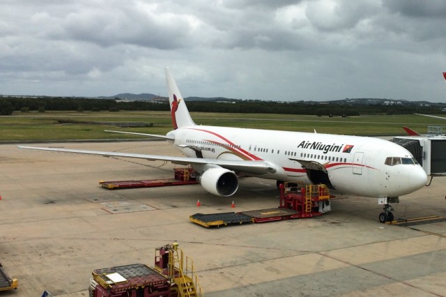 P2-PXV a 767-383/ER waiting for boarding at BNE's gate 85. Photo by Bernie Leighton | AirlineReporter.com