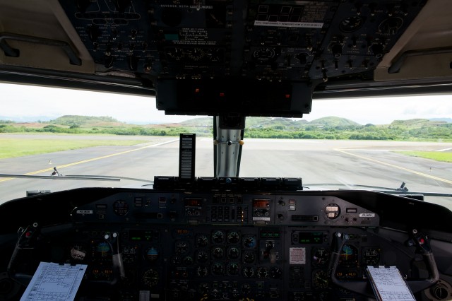 Completing the pre-takeoff checklist at the hold short line in Port Moresby. Photo by Bernie Leighton | AirlineReporter.com