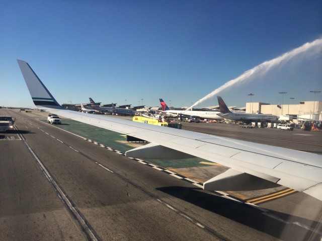 The LAX fire department gives our flight with a fallen soldier a water cannon  salute. Photo: David Parker Brown / AirlineReporter.com