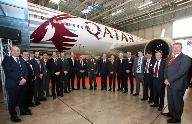 Senior from Airbus & Qatar Airways pose in front of an Airbus A350 with a special launch customer livery - Photo: Qatar Airways