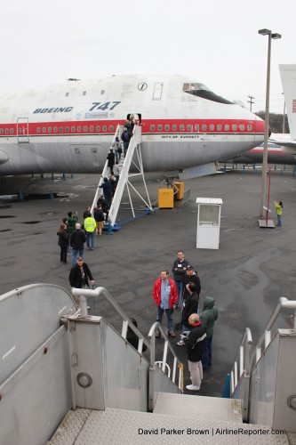As I am about to board the Contellation, I take this photo of AvGeeks boarding the first 747.