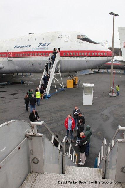 As I am about to board the Contellation, I take this photo of AvGeeks boarding the first 747. 