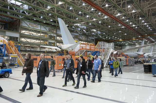I am in the blue shirt, checking out the 787 line from the factory floor while talking airplanes with Zee Zirilla - Photo: The Boeing Company