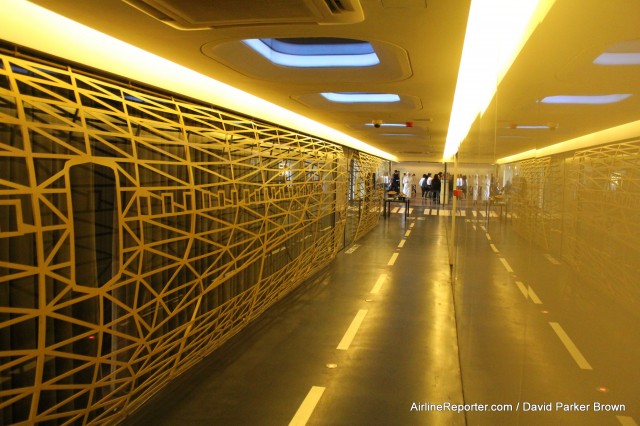 The Turkish trainers on on the left and the hallway looks like a runway