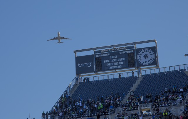 The Seahawks painted 747 flies over CenturyLink Field yesterday as the team arrived to the field - Photo: Boeing