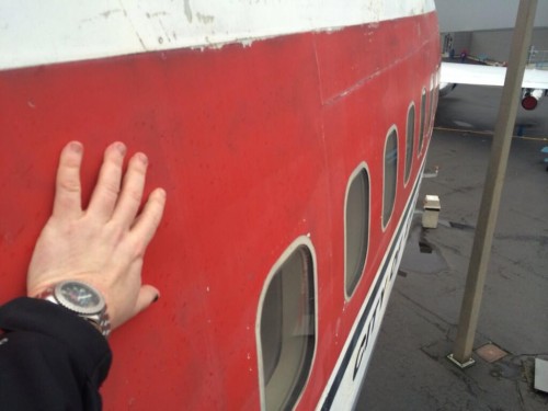 I couldn't help but to touch the outside of the first ever Boeing 747 before going in. And no, I didn't paint my finger nail, recently smashed it -- ouch. Photo: David Parker Brown | AirlineRepoter