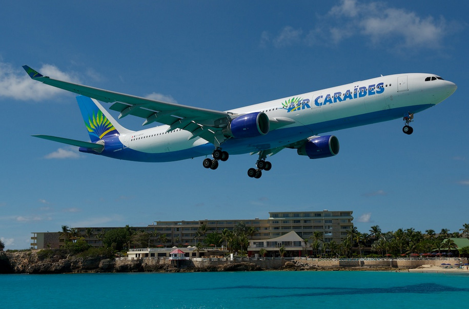 An Air Caraîbes Airbus A330 touching down at St. Martin - Photo: Bernie Leighton