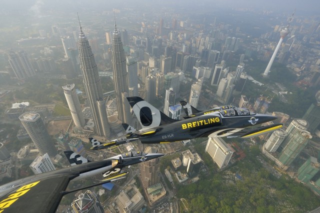 The Breitling Jet Team passing over the Petronas Towers in Kuala Lumpur Malaysia - Photo: Tokunaga Breitling SA