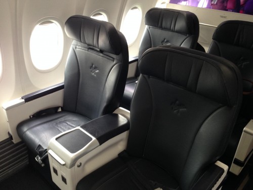 The business seating  lacks a few core features such as a foot-rest, the legroom is also a bit on the tight side The 8 seat business cabin on-board the 737-800 with the see through divider Photo: Jacob Pfleger | AirlineReporter