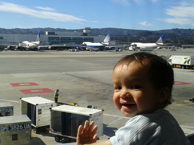 Start 'em early! Author's son planespotting at SFO. Photo: David Delagarza