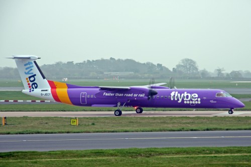 G-JECY Dash 8Q-402 in the new purple livery at Manchester, UK