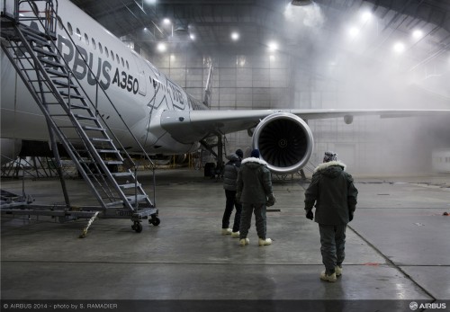 Crew walking around the outside of the A350 - Photo: Airbus