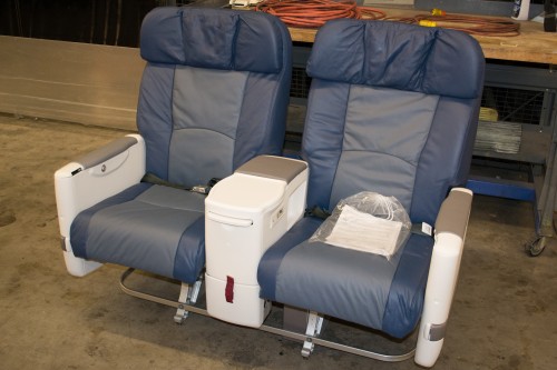Two first class seats sitting outside the aircraft - Photo: Jason Rabinowitz