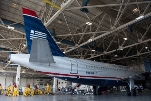 Tail of an Airbus A319 in the maintenance facility - Photo: Jason Rabinowitz