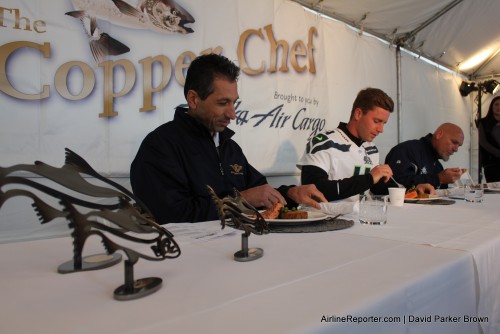 The judges do their duty and try the salmon