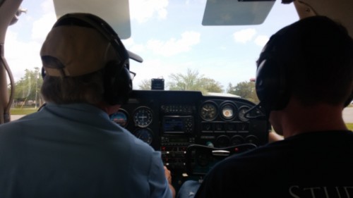 I film in the backseat as we taxi out for the runway inside a Cessna 172 Skyhawk.