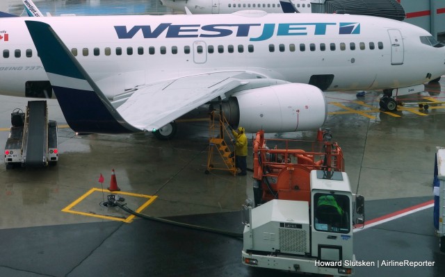 Westjet Boeing 737-700 being refueled from a ramp hydrant at YYZ.