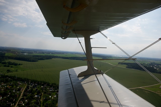 The wing view out of an AN-2. Photo - Bernie Leighton | AirlineReporter.com