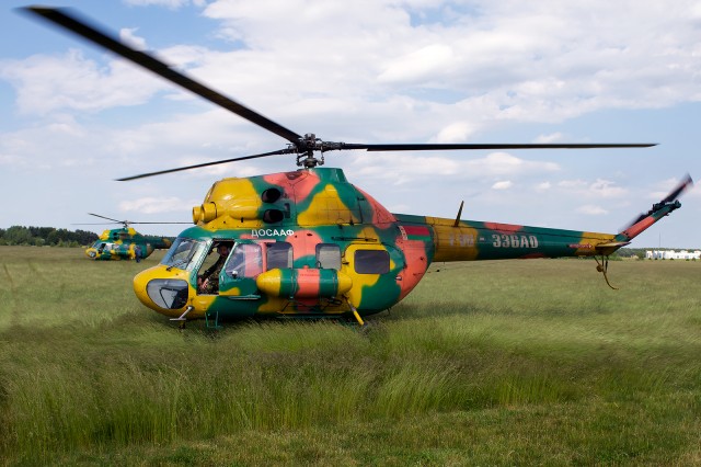 So loud, I am surprised you can't hear them through the photo. Two DOSAAF of Belarus MI-2 await boarding, by me. Photo - Bernie Leighton | AIrlineReporter.com