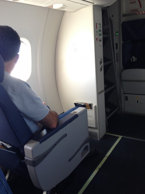 Comfortable first class seatings on the United Q400 - Photo: Blaine Nickeson | AirlineReporter