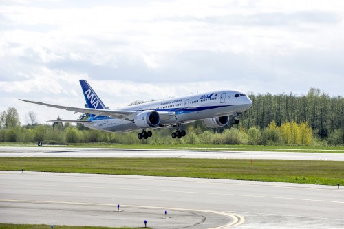 Photo and press release from Boeing: EVERETT, Wash., July 29, 2014 /PRNewswire/ -- Boeing (NYSE:BA) and All Nippon Airways (ANA) today celebrated the delivery of the airline's first 787-9 Dreamliner. ANA will become the world's first airline to operate both the 787-8 and 787-9 variants of the Dreamliner family when the airline launches 787-9 services on domestic Japanese routes in August. "The 787 Dreamliner is a key element in our growth strategy and we are proud to be the first airline to fly both models of the 787 family," said Osamu Shinobe, ANA president and CEO. "The new 787-9 will build on the exceptional efficiency of the 787-8 and will allow us to meet growing demand that is anticipated ahead of the 2020 Tokyo Summer Olympics. Our customers have expressed their pleasure with the comfort of the 787's innovative cabin features and we are excited to introduce the new 787 variant into our fleet." With this delivery, ANA will have 29 787s in its fleet, more than any other operator in the world. "This milestone delivery adds yet another chapter in our long and successful relationship with ANA," said John Wojick, senior vice president of Global Sales and Marketing, Boeing Commercial Airplanes. "ANA continues to demonstrate the market-leading efficiency and comfort of the 787 family." The 787-9 complements and extends the 787 family. With the fuselage stretched by 20 feet (6 meters) over the 787-8, the 787-9 will fly up to 40 more passengers an additional 450 nautical miles (830 kilometers) with the same exceptional environmental performance — 20 percent less fuel use and 20 percent fewer emissions than similarly sized airplanes. The 787-9 leverages the visionary design of the 787-8, offering passenger-pleasing features such as large windows, large stow bins, modern LED lighting, higher humidity, a lower cabin altitude, cleaner air and a smoother ride. ANA has 29 more 787-9s on order with commitments for 14 more. Sixty customers from around the world have ordered more than 1,000 787s, with more than 160 currently in operation.