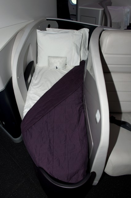 The Business Premiere seat in bed-mode. Photo - Bernie Leighton | AirlineReporter
