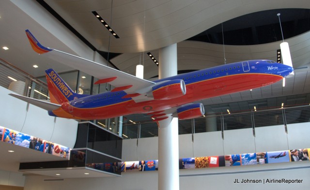 A large scale model of Warrior One, Southwest's first 737-800 hangs from the ceiling of TOPS.