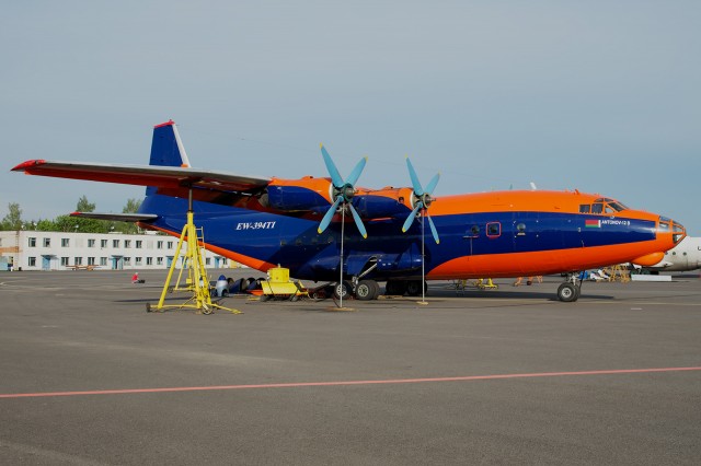 An AN-12 undergoing a maintenance procedure- outdoors- in Mogilev, Belarus. Photo - Bernie Leighton | AirlineReporter