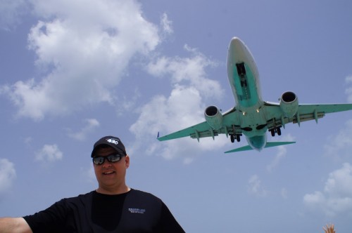 The author standing directly below a Boeing 737 about to land - Photo: Julian Cordle