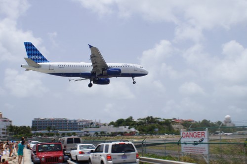 The road is tiny between the airport and beach - Photo: Julian Cordle