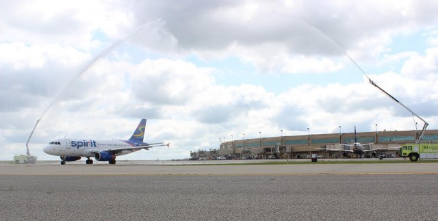 Spirit's first flight out of Kansas City receives a dual water cannon salute. Photo credit Aaron Wright, KC Aviation Dept.