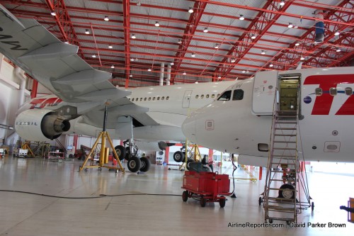 A TAM Airbus A330 and A320 get worked on at the MRO