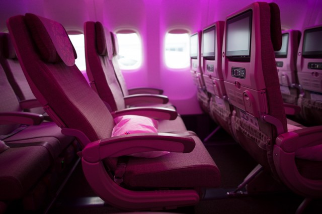 Economy seats in a pink hue - Photo: Jeremy Dwyer-Lindgren | NYCAviation.com