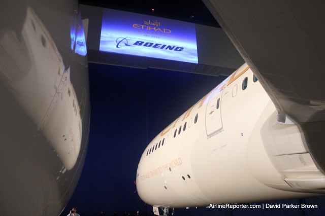 Boeing displayed their logo with Etihad's on the hangar. This is standing between the plane and the GEnx engine