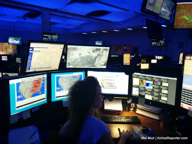 Southwest's inhouse Weather Department in the NOC.  That screen on the right is a Tweetdeck feed with a whole lot of Weather advisory information.