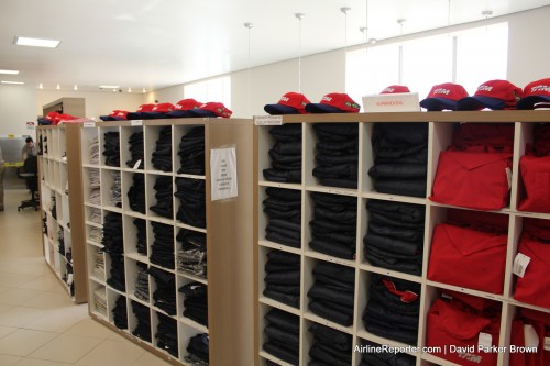 Many shelves of different clothing options