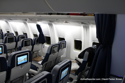 Flight attendants have a similar set up located in the back of the economy cabin