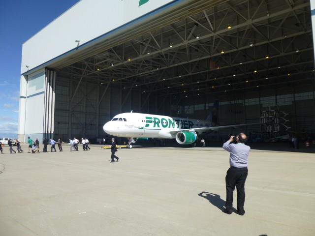 N227FR, a brand-new A320 with sharklets, was pulled from the hangar by Frontier staff - Photo: Blaine Nickeson | AirlineReporter