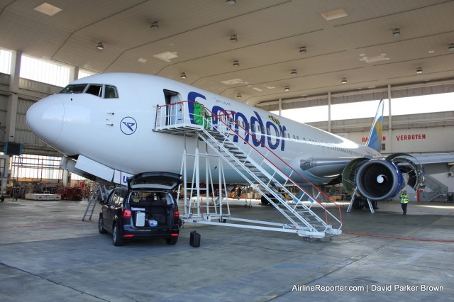 A Condor Boeing 767-300 being worked on in their maintenance facility.