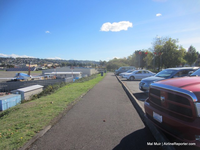 A Great parking area adjacent to the runway.  Gives great views and during summer, their is a picnic table to enjoy some lunch in the summer sun.