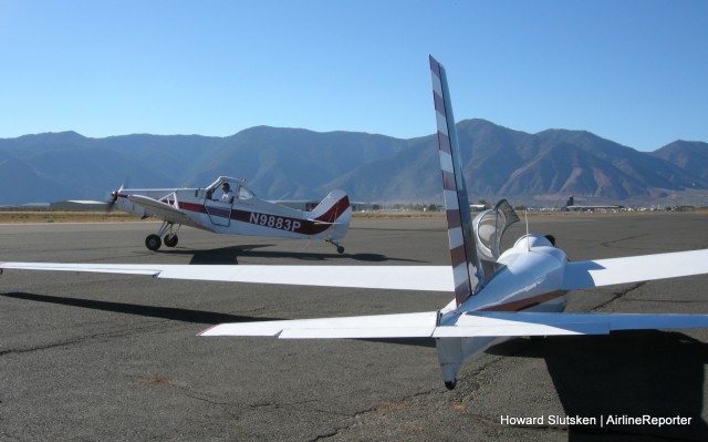 The tow plane moves into position in front of the Schweizer 2-32.