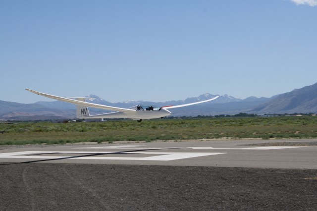With airbrakes out, a Duo DIscus is about to touch down on Runway 30 at Minden-Tahoe Airport. Photo: Soaring NV