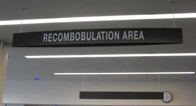 Recombobulation area seen just past the TSA checkpoint at Milwaukee's General Mitchell airport. Photo: Celia | Flickr CC