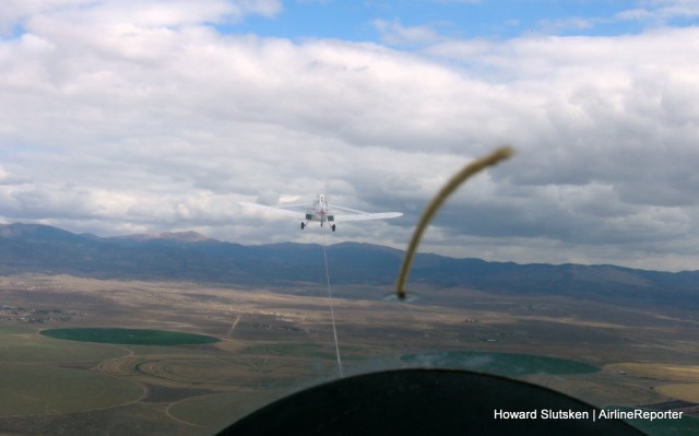 On tow behind the Pawnee, heading east, over the Carson Valley