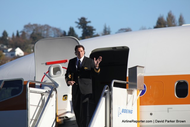 John Travolta coming out of the Qantas' 737