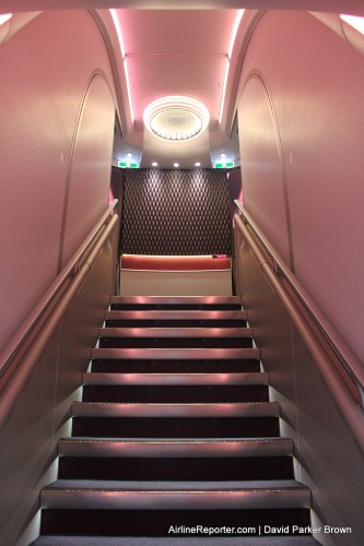 Up the forward stairs to the First Class cabin -- it is very welcomeing