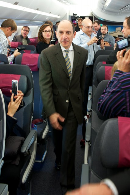 His Excellency, Akbar Al Baker walking through the cabin whilst Airways News Founder Chris Sloan tweets the very same photo. Photo - Bernie Leighton | AirlineReporter